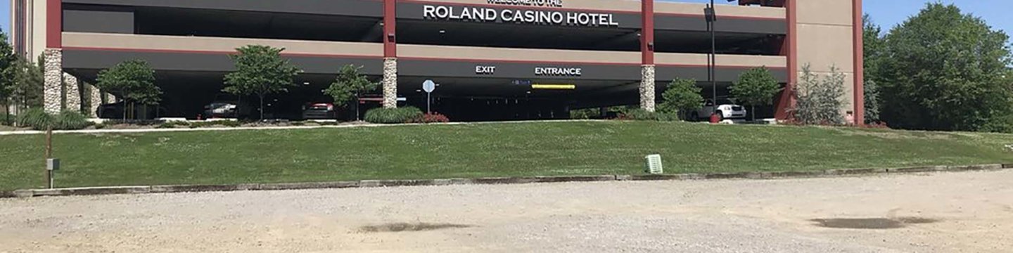 a view of the Roland Casino Hotel and attached parking garage